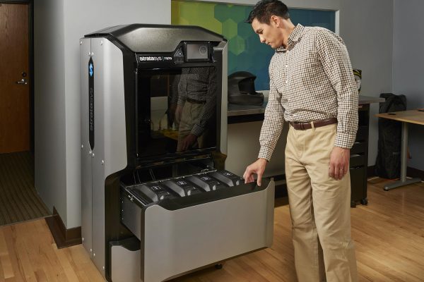 F370 - Man With Printer and Open Material Bays